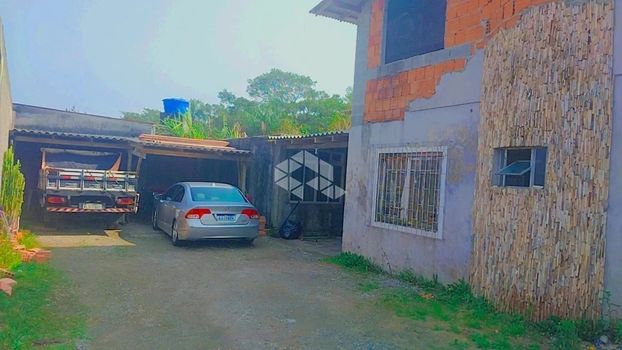 Foto 1 do(a) Casa de 5 quartos à venda em Tapera da Base, Florianópolis