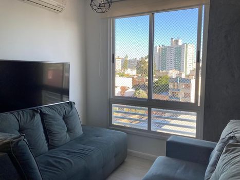 Foto 4 do(a) Flat de 2 quartos à venda em Partenon, Porto Alegre