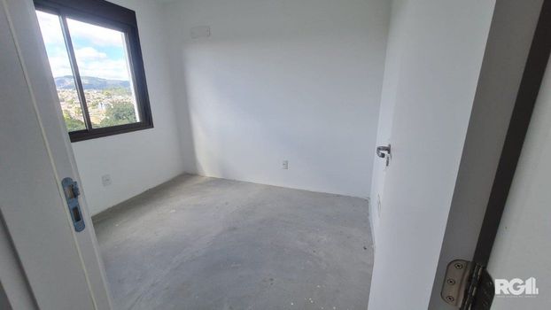 Foto 7 do(a) Flat de 2 quartos à venda em Jardim do Salso, Porto Alegre