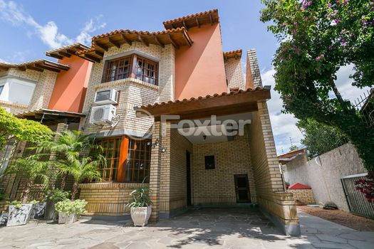 Foto 1 do(a) Casa de 3 quartos à venda em Guarujá, Porto Alegre