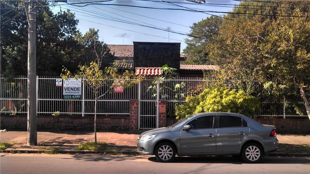 Foto 1 do(a) Casa de 3 quartos à venda em São Geraldo, Porto Alegre