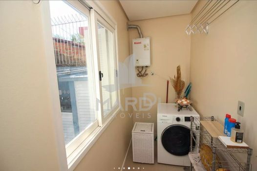 Foto 26 do(a) Casa em Condomínio de 2 quartos à venda em Vila Nova, Porto Alegre