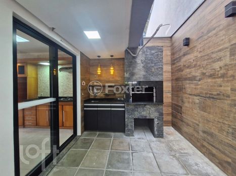 Foto 9 do(a) Casa em Condomínio de 3 quartos à venda em Vila Conceição, Porto Alegre