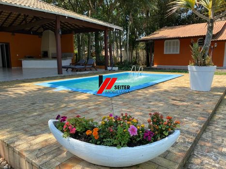 Foto 4 do(a) Casa de 4 quartos à venda em Vargem Grande, Florianópolis