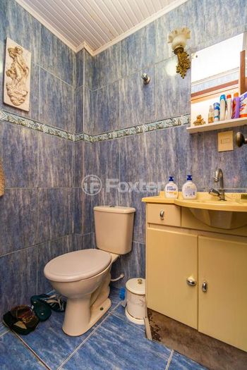 Foto 7 do(a) Casa em Condomínio de 3 quartos à venda em Santo Antônio, Porto Alegre