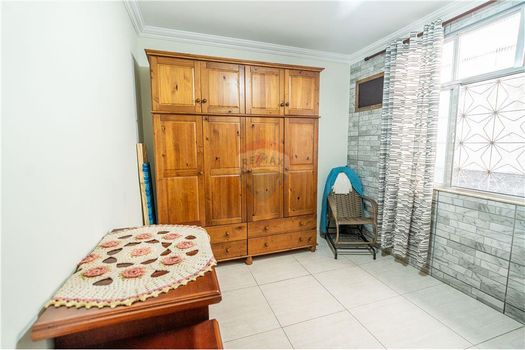 Foto 18 do(a) Casa de 4 quartos à venda em Zumbi, Rio de Janeiro