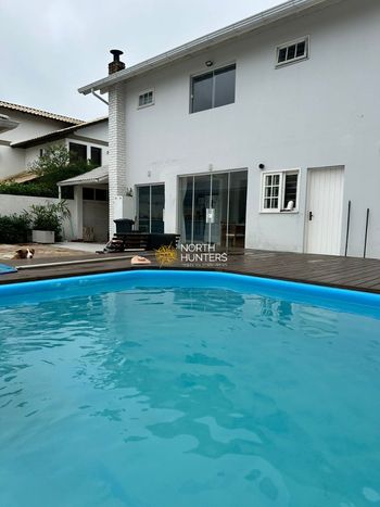Foto 3 do(a) Casa de 5 quartos para alugar em Jurerê Internacional, Florianópolis