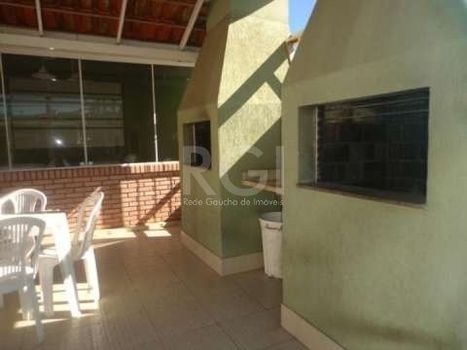 Foto 30 do(a) Casa em Condomínio de 3 quartos à venda em Vila Nova, Porto Alegre