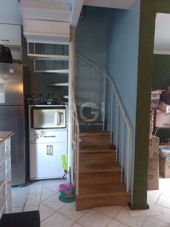 Foto 11 do(a) Casa em Condomínio de 3 quartos à venda em Vila Nova, Porto Alegre