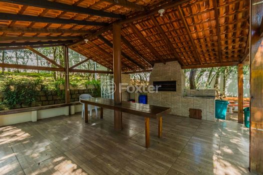 Foto 18 do(a) Casa em Condomínio de 2 quartos à venda em Vila Nova, Porto Alegre
