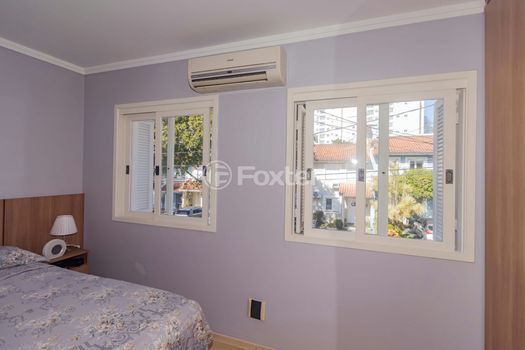 Foto 31 do(a) Casa em Condomínio de 2 quartos à venda em Vila Nova, Porto Alegre
