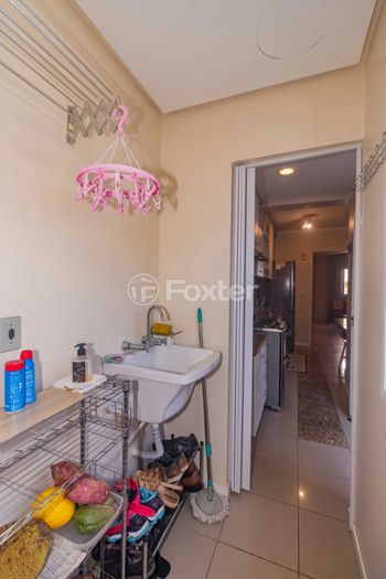 Foto 22 do(a) Casa em Condomínio de 2 quartos à venda em Vila Nova, Porto Alegre