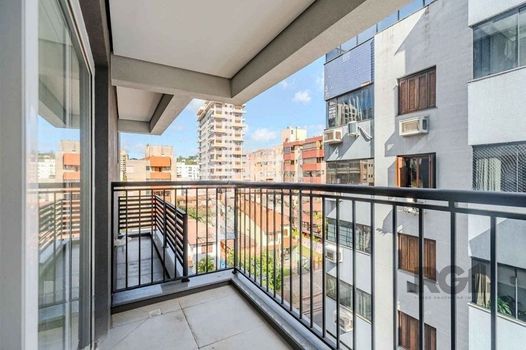 Foto 1 do(a) Flat de 2 quartos à venda em Menino Deus, Porto Alegre