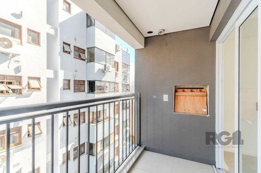 Foto 2 do(a) Flat de 2 quartos à venda em Menino Deus, Porto Alegre