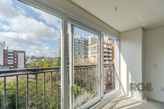 Foto 3 do(a) Flat de 2 quartos à venda em Menino Deus, Porto Alegre