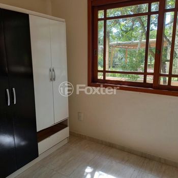 Foto 13 do(a) Casa em Condomínio de 4 quartos à venda em Tarumã, Viamão