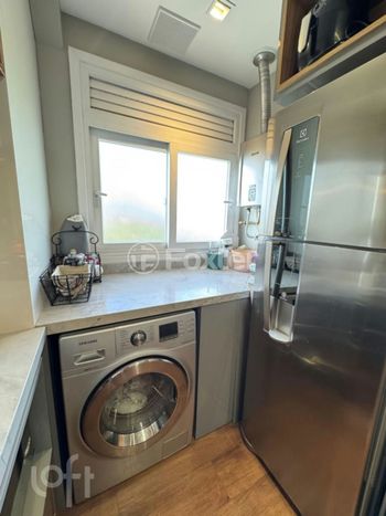 Foto 4 do(a) Apartamento de 2 quartos à venda em Navegantes, Porto Alegre