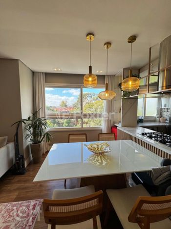 Foto 2 do(a) Apartamento de 2 quartos à venda em Navegantes, Porto Alegre