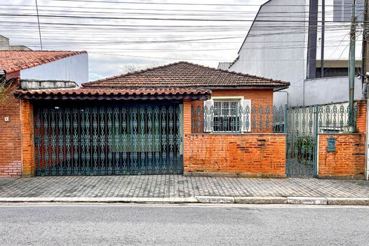 Foto 1 do(a) Casa de 4 quartos à venda em Suíssa, Ribeirão Pires