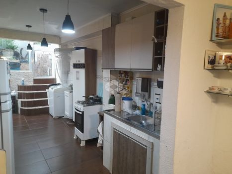Foto 11 do(a) Casa em Condomínio de 3 quartos à venda em Santo Antônio, Porto Alegre