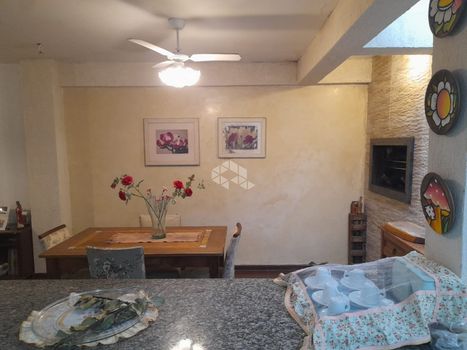 Foto 3 do(a) Casa em Condomínio de 3 quartos à venda em Santo Antônio, Porto Alegre