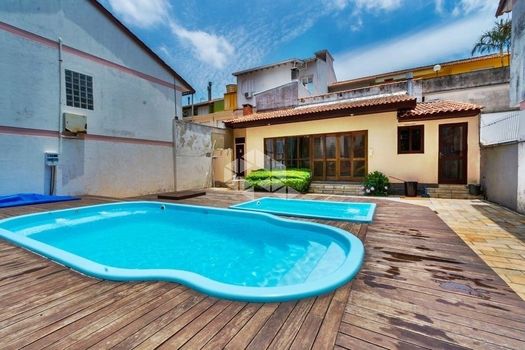 Foto 38 do(a) Casa em Condomínio de 3 quartos à venda em Santo Antônio, Porto Alegre