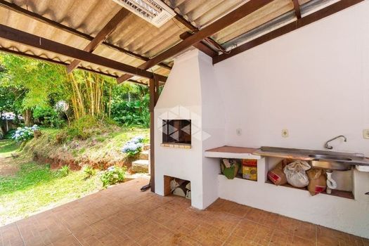 Foto 40 do(a) Casa em Condomínio de 3 quartos à venda em Santo Antônio, Porto Alegre