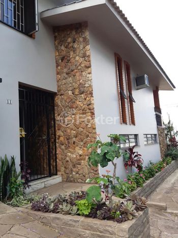 Foto 2 do(a) Casa de 3 quartos à venda em Primavera, Novo Hamburgo