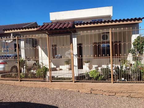 Foto 2 do(a) Casa de 3 quartos à venda em Guajuviras, Canoas