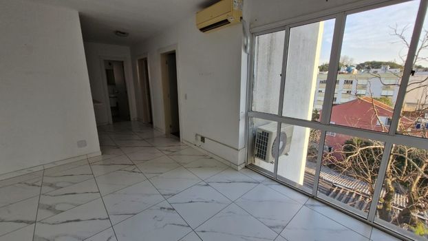Foto 2 do(a) Apartamento de 2 quartos à venda em Teresópolis, Porto Alegre
