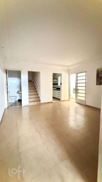 Foto 1 do(a) Casa de 4 quartos à venda em Parque Maria Helena, São Paulo