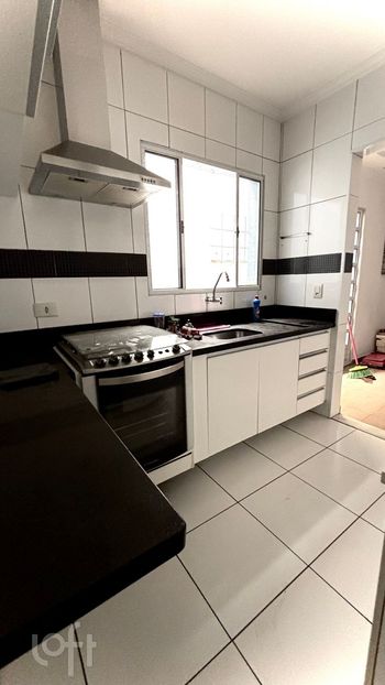 Foto 3 do(a) Casa de 4 quartos à venda em Parque Maria Helena, São Paulo
