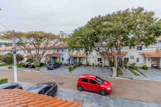 Foto 16 do(a) Casa em Condomínio de 3 quartos à venda em Vila Nova, Porto Alegre
