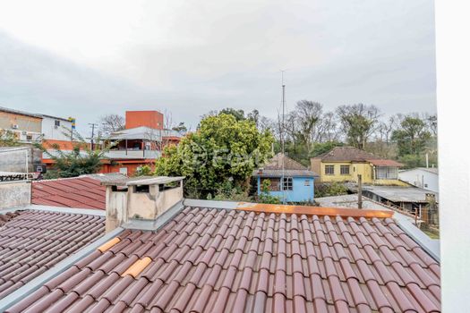 Foto 11 do(a) Casa em Condomínio de 3 quartos à venda em Vila Nova, Porto Alegre