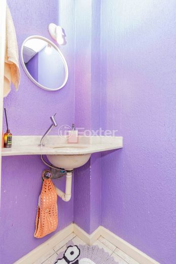 Foto 27 do(a) Casa em Condomínio de 3 quartos à venda em Vila Nova, Porto Alegre