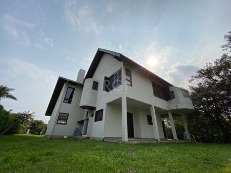 Foto 1 do(a) Casa em Condomínio de 3 quartos à venda em null, Osório
