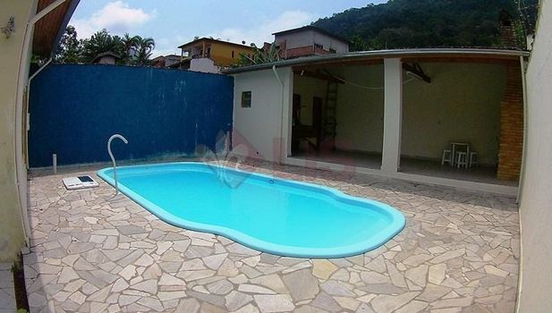 Foto 5 do(a) Casa de 3 quartos à venda em Cidade Jardim, Caraguatatuba