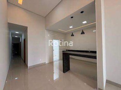 Foto 1 do(a) Casa de 3 quartos à venda em Segismundo Pereira, Uberlândia
