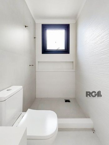 Foto 26 do(a) Casa em Condomínio de 4 quartos à venda em Vila Nova, Porto Alegre