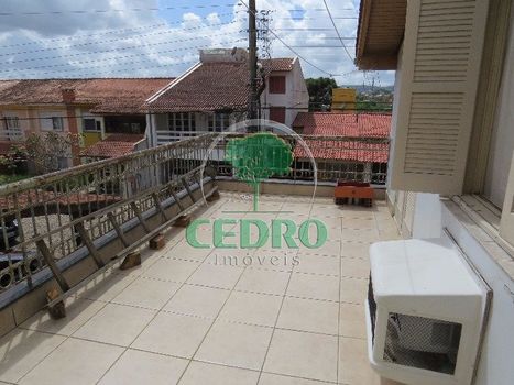 Foto 14 do(a) Casa em Condomínio de 4 quartos à venda em Santo Antônio, Porto Alegre