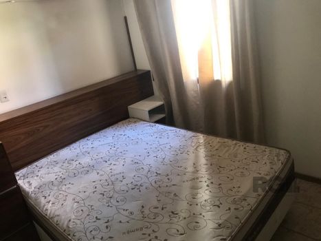 Foto 30 do(a) Casa em Condomínio de 2 quartos à venda em Vila Nova, Porto Alegre