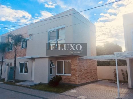 Foto 3 do(a) Casa em Condomínio de 3 quartos à venda em Vila Nova, Porto Alegre