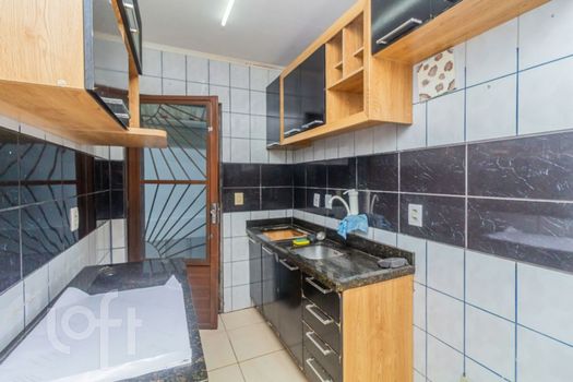 Foto 23 do(a) Casa em Condomínio de 3 quartos à venda em Vila Nova, Porto Alegre
