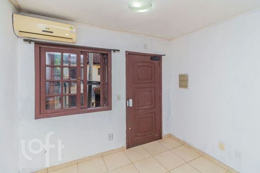 Foto 4 do(a) Casa em Condomínio de 3 quartos à venda em Vila Nova, Porto Alegre