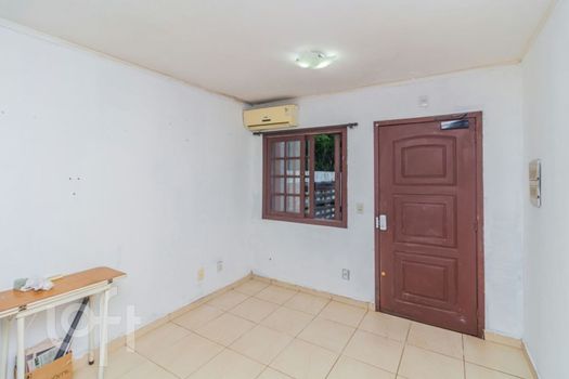 Foto 3 do(a) Casa em Condomínio de 3 quartos à venda em Vila Nova, Porto Alegre