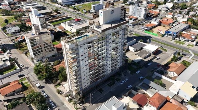 Foto 2 do(a) Apartamento de 3 quartos à venda em Vila Moema, Tubarão