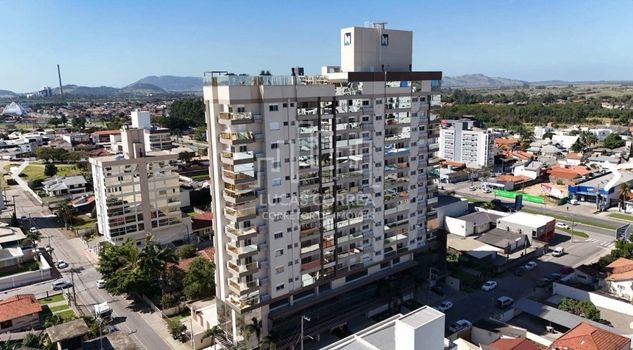 Foto 3 do(a) Apartamento de 3 quartos à venda em Vila Moema, Tubarão