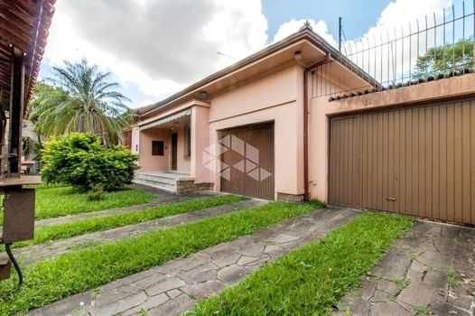 Foto 1 do(a) Casa de 3 quartos à venda em Jardim Botânico, Porto Alegre