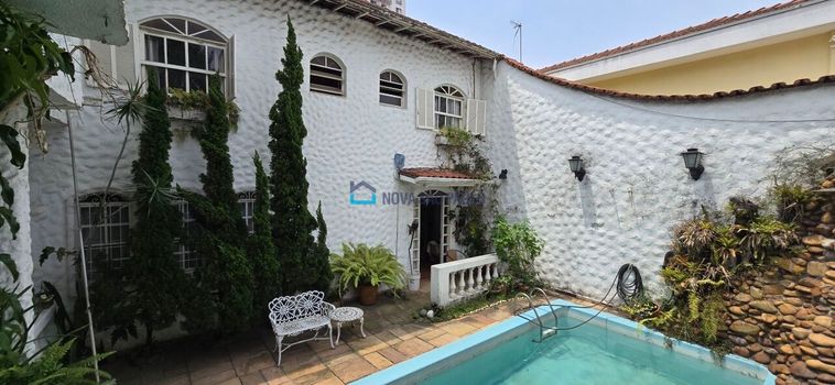 Foto 6 do(a) Casa de 4 quartos à venda em Vila Santo Estéfano, São Paulo