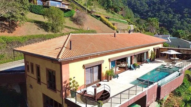 Foto 2 do(a) Casa em Condomínio de 5 quartos à venda em Itaipava, Petrópolis